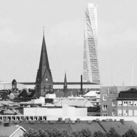 Bild över Malmö med Turning Torso i bakgrunden.