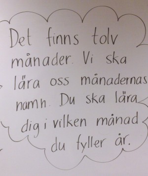 Instruktion på tavlan.