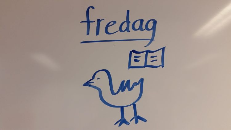 Tecknad anka på whiteboard.