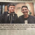 Tidningsurklipp med två elever.