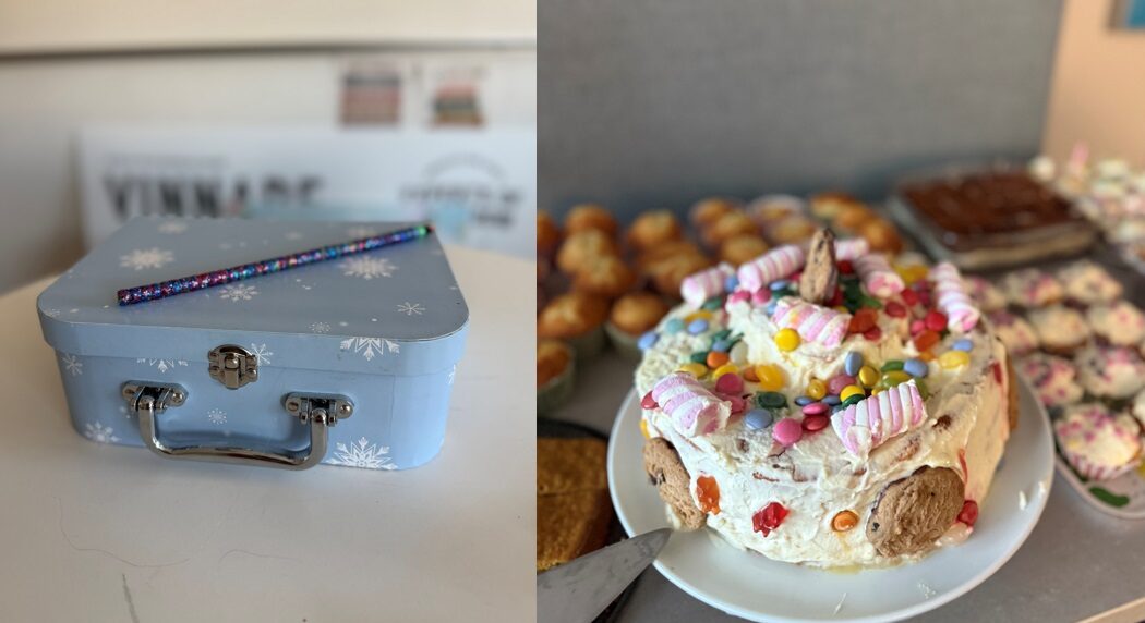 En väska med en färgglad penna på och en födelsedagstårta dekorerad med godis.