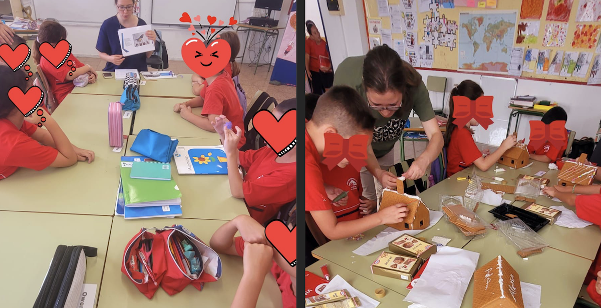 Barn i ett klassrum arbetar med pyssel vid bord, med skolmaterial och kartor på väggarna. En vuxen hjälper två barn att montera små kartonghus.